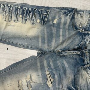 AMIRI Faded Blue Distressed Jeans